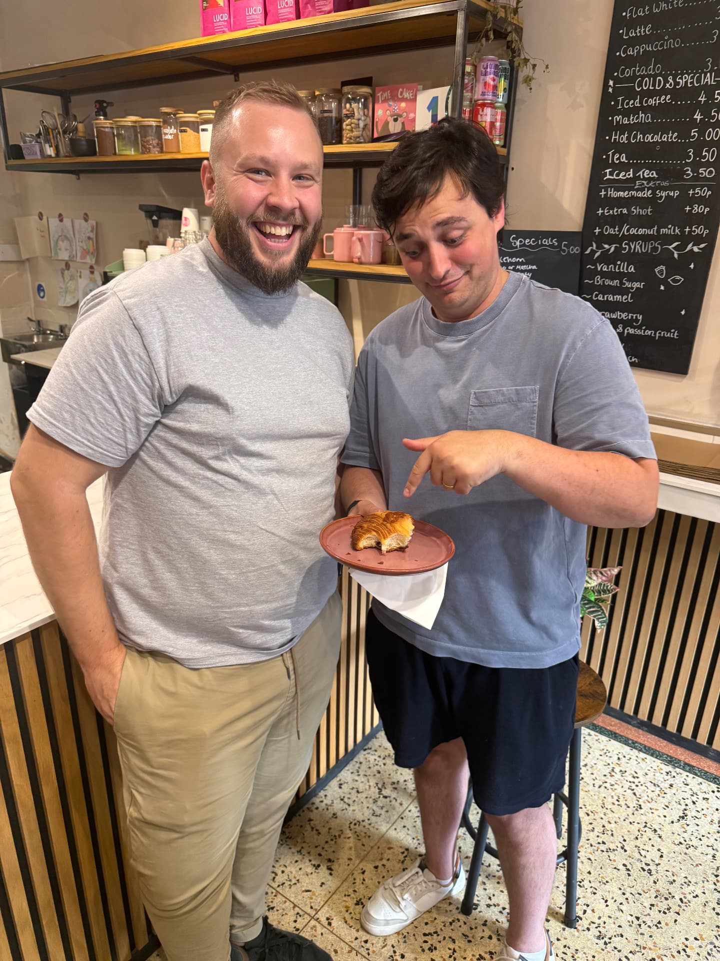 Two members sharing a pastry at Krumb Bakery